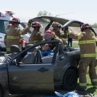 Lemoore Volunteer Firemen respond to the scene of an "Every 15 Minutes" accident on Thursday, April 27 in Tiger Stadium.